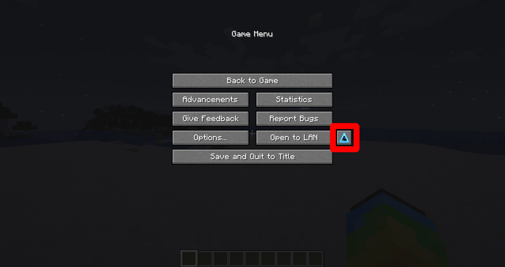 The Minecraft pause menu with the Figura triangle to the right of the Open to LAN button